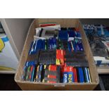 A box full of zip and floppy discs.