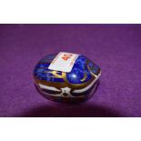 A Royal Crown Derby paperweight Millenium Bug with gold stopper