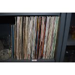 A selection of vinyl records and albums including Super Tramp Roberta Flack Carpenters etc