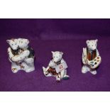 Three Royal Crown Derby paperweights Hugging Bears, Claude Artist Bear and Mummy and Charlotte