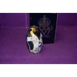 A Royal Crown Derby paperweight Penguin and Chick with a Gold stopper