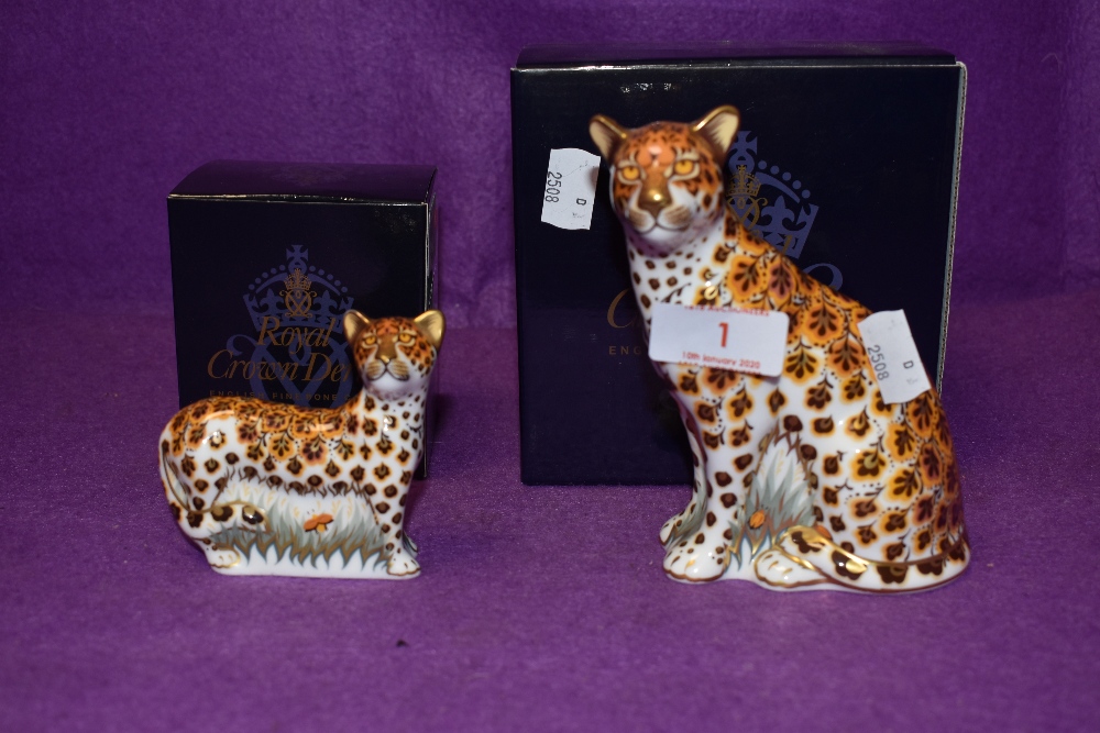 Two Royal Crown Derby paperweights. Cheetah and Cheetah Cub, both boxed and with gold stoppers