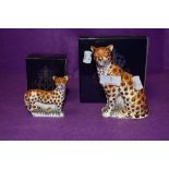 Two Royal Crown Derby paperweights. Cheetah and Cheetah Cub, both boxed and with gold stoppers