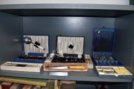 A selection of boxed table flat wares and cutlery including Firth knives and cake knife