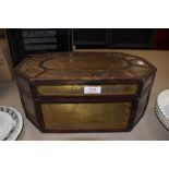 A vintage casket or box of unusual shape.