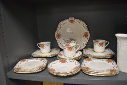 A part tea service by Taylor and Kent in an art deco design having enamel detailing