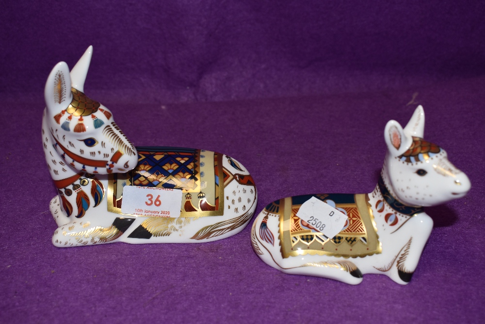 Two Royal Crown Derby paperweights Donkey and Donkey Foal, with gold stoppers