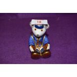 A Royal Crown Derby paperweight Schoolboy Teddy with a Gold stopper