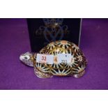 A Royal Crown Derby paperweight Indian Star Tortoise, boxed with a gold stopper