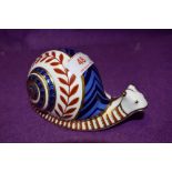 A Royal Crown Derby paperweight Snail with silver stopper