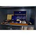 A selection of cutlery and tableware including oak cased canteen and Unity Sheffield knives etc