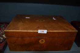 An inlayed satin wood jewellery or trinket case having musical mechanism