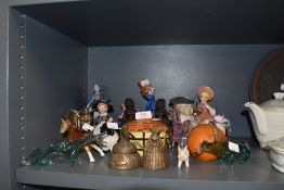 A selection of figures and figurines including highland sheep