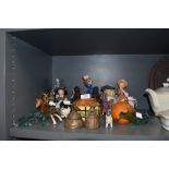 A selection of figures and figurines including highland sheep