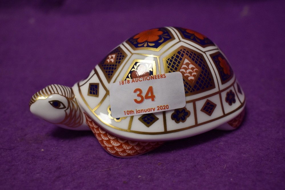 A Royal Crown Derby paperweight Imari Tortoise, with silver stopper