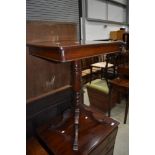 A 19th Century mahogany occasional pedestal table, top having frieze drawers to both ends, quadruple