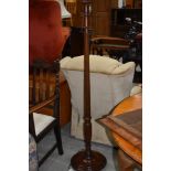 An early 20th Century mahogany standard lamp