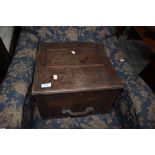 A vintage oak box having lift lid