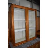 A stained pine bookcase/display top, approx. width 93cm