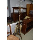 A Victorian brass standard lamp