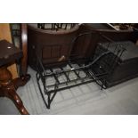 A Victorian style metal travel cot