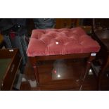 A modern pink dralon dressing table stool