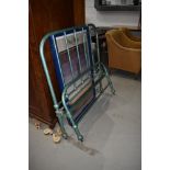 A vintage cast hospital or barrack style bed, approx. 107cm (3ft6) width, with sprung base