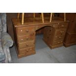 A modern natural pine dressing table/desk, approx. width 132cm