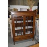 An early 20th Century mahogany display cabinet with lower drawer, dimensions approx. Width 99cm