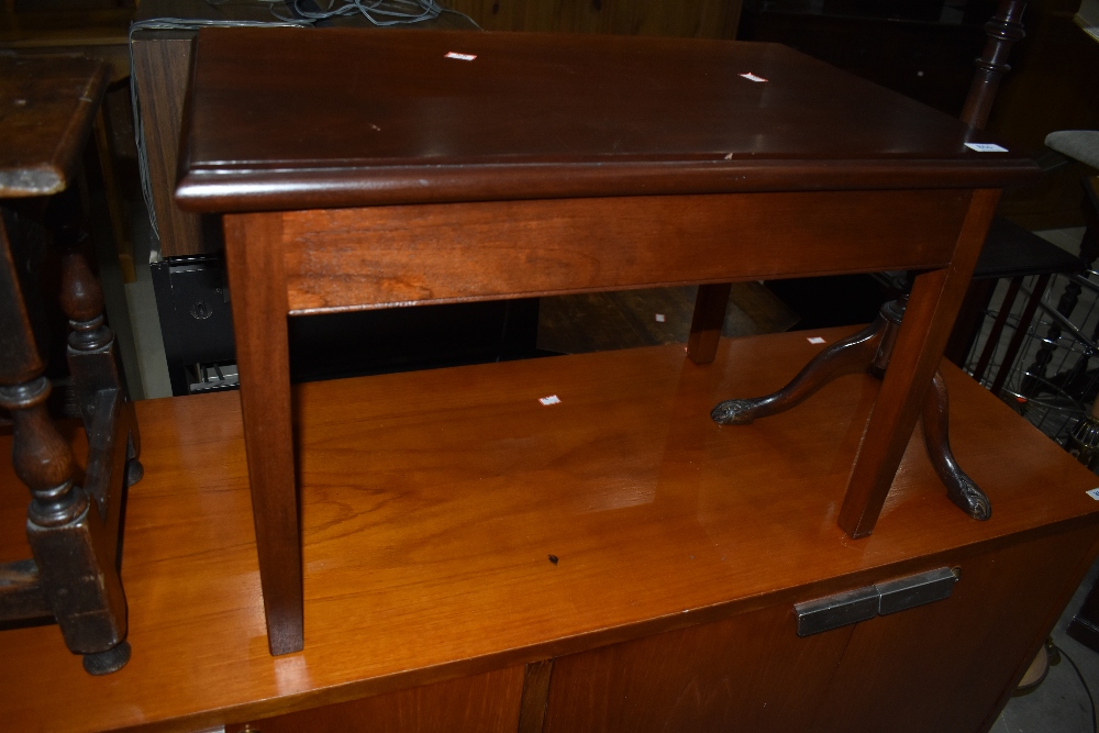 A modern mahogany occasional/coffee table, approx. 26 x 41cm