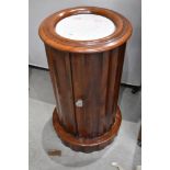 A 19th Century mahogany plant stand having marble inset top