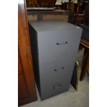 A laminate filing cabinet, three drawers, in gun metal grey, height approx. 103cm