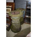 A pair of sandstone urns, originally from Grizedale Hall, purchased at the dispersal sale by the cur