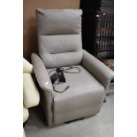 A modern beige electric recliner chair