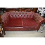 A late 19th or early 20th Century , red leather button back two seater settee having later dralon