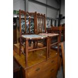 A pair of Edwardian mahogany and inlaid bedroom chairs