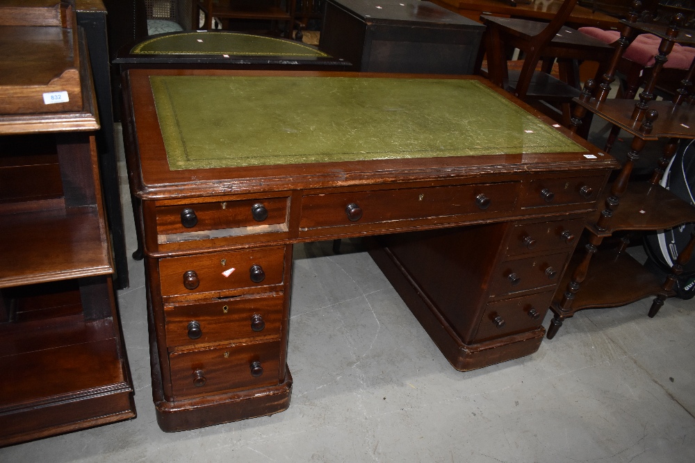 A late Victorian stained frame pedestal desk having skiver top, approx. 120 x 72cm