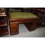 A late Victorian stained frame pedestal desk having skiver top, approx. 120 x 72cm