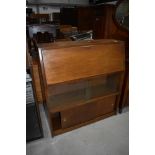 A vintage sapele bookcase with double bookcase under, width approx. 91cm