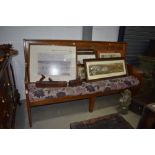 A traditional golden oak settle, having five panels to back and solid ends, width approx. 196cm