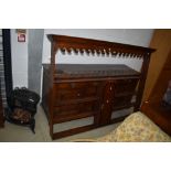 A period oak dresser having open back, width approx. 179cm