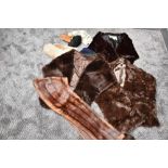 An assortment of vintage gloves and mittens and scarves including fur stoles,one being mink.