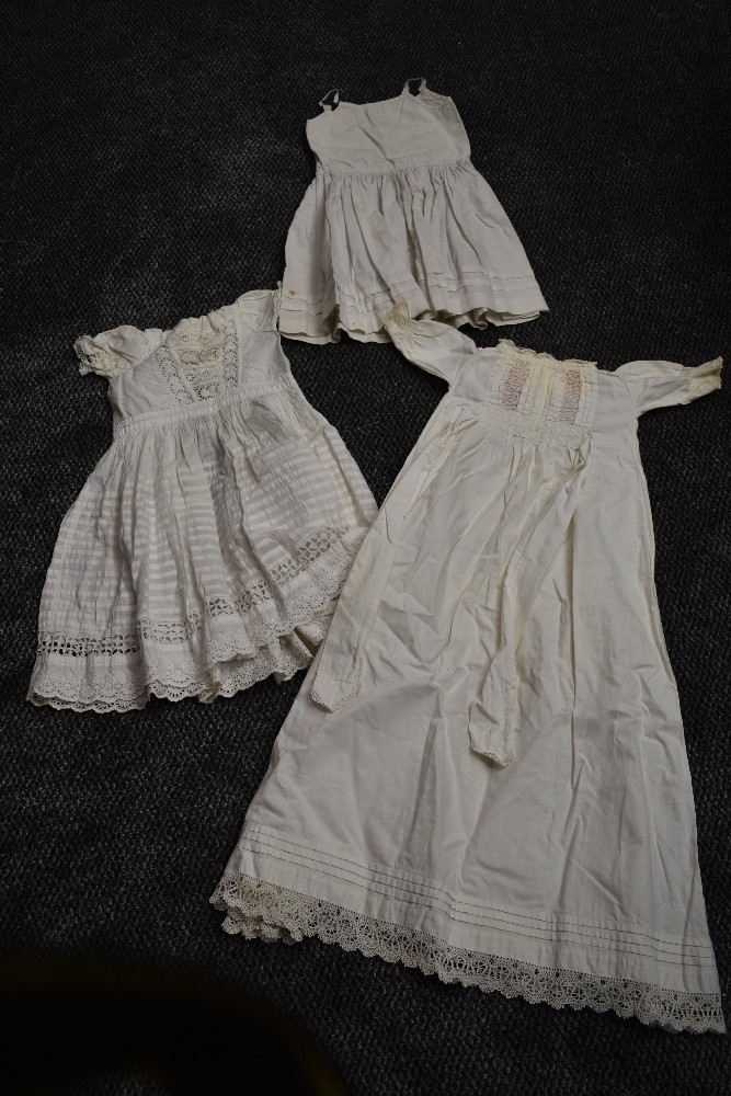 Two early 20th century childrens dresses with beautiful cut work and embroidered techniques used,