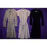 Three vintage 1970s dresses.