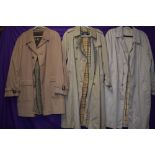 Three gents 1970s to 80s raincoats, including Burberry.