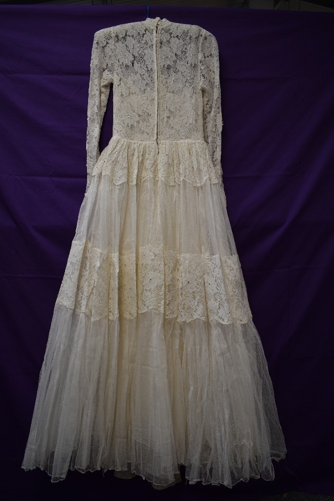 A vintage 1950s tulle and lace wedding dress having rhinestone details throughout,high neckline - Image 3 of 3