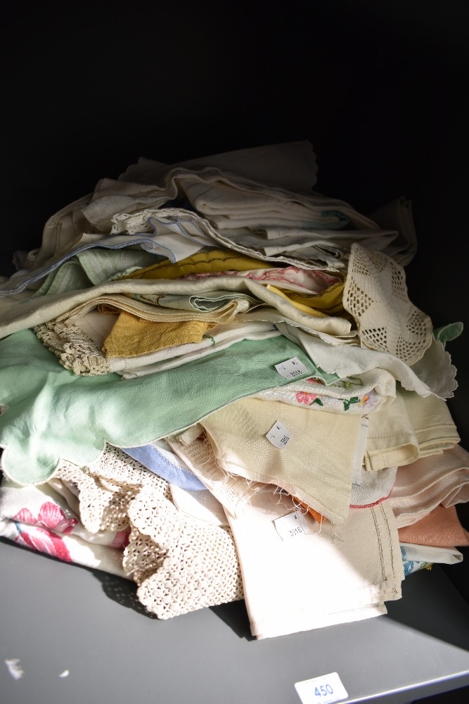 A varied lot of table linen, a lot of items having bright embroidery.