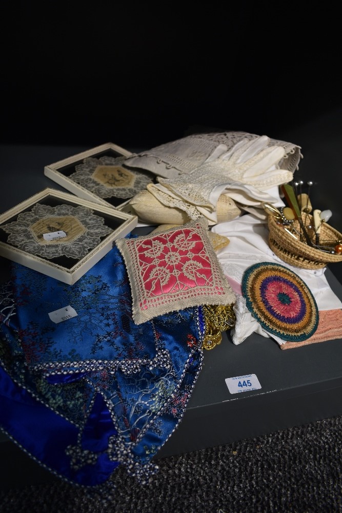 A collection of hat pins, gloves, handkerchiefs and other accessories, including two framed lace