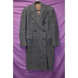 A vintage 1940s CC41 gents double breasted coat in blue checked wool having half belt to vented