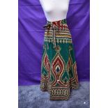 A bright vintage wrap around skirt from Burma and similar styled tunic